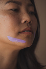 An image of a woman with a stripe of Alpenglow on her chin